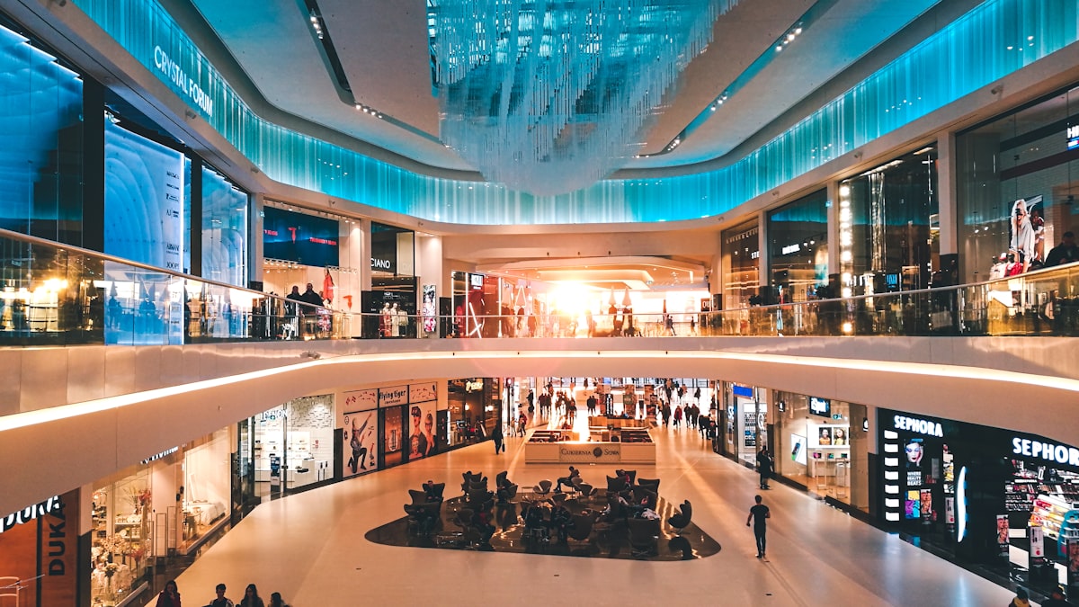 Pop-up brand experience in a high-traffic luxury mall.